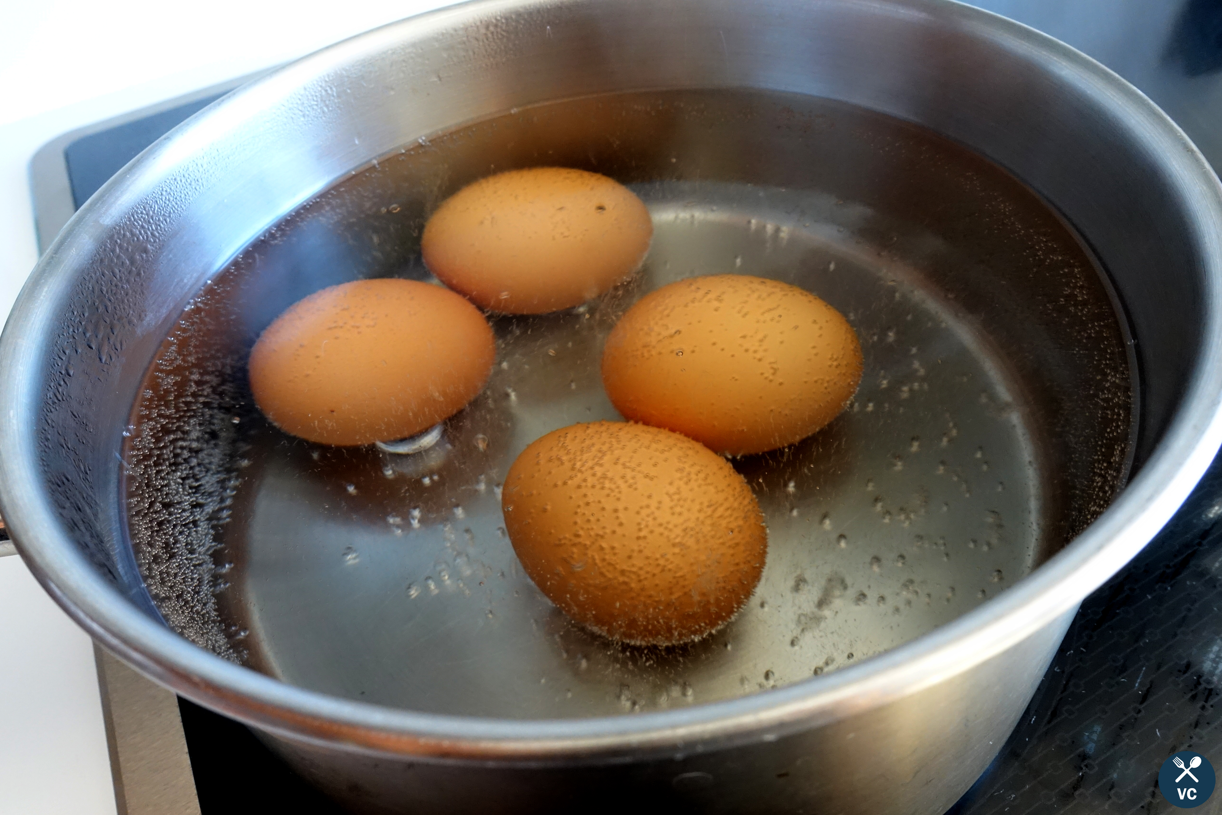 Boiling eggs in water to make hard or soft boiled eggs (VC in the Kitchen)