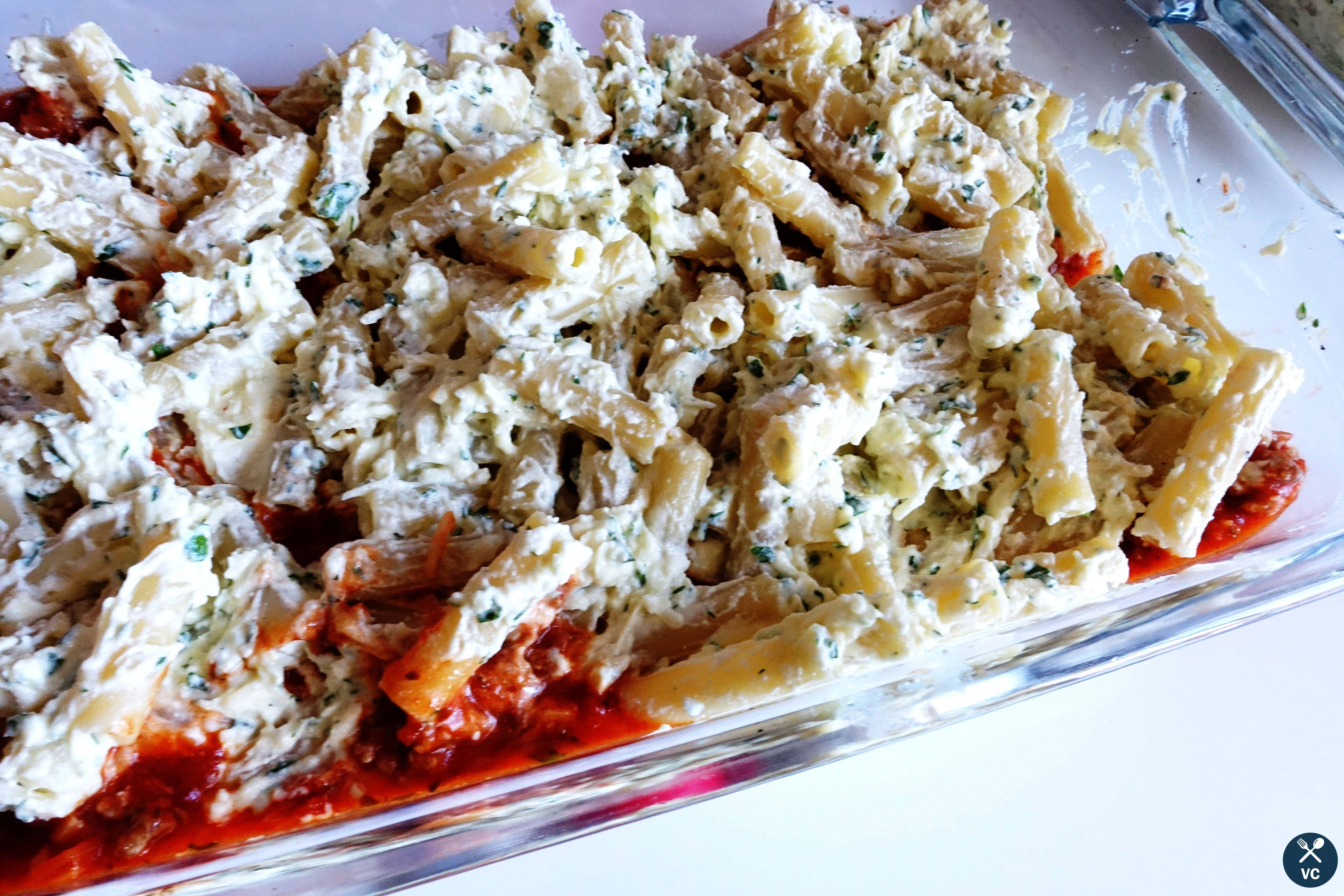 Layers of pasta and sauce for baked ziti with sausage (VC in the Kitchen)