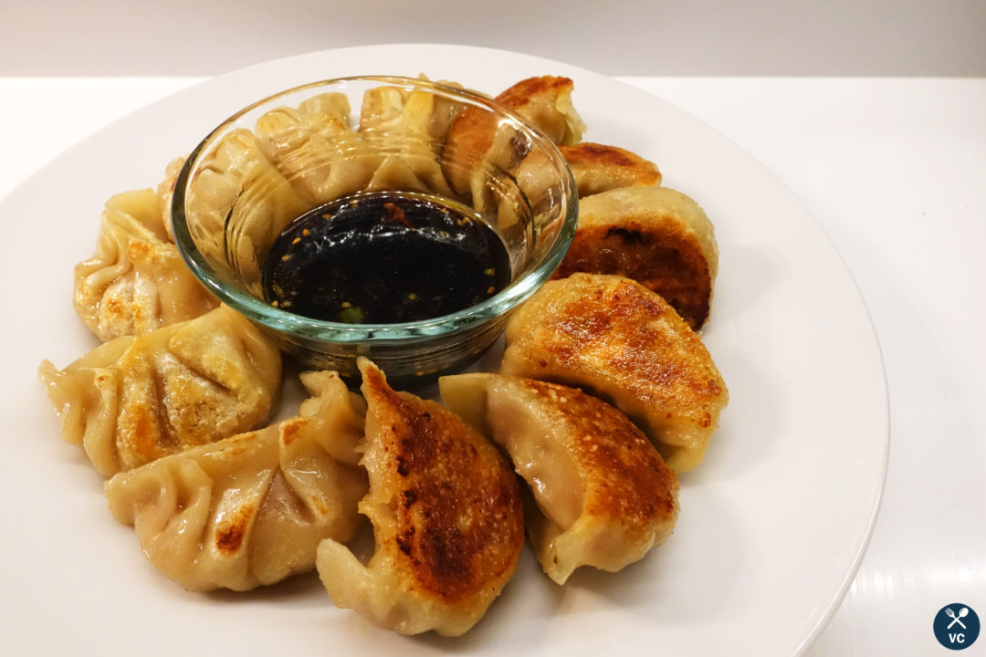 Finished cooked crispy Asian pork and cabbage dumplings (VC in the Kitchen)